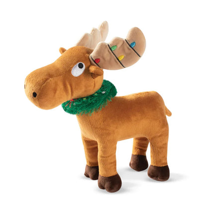 Plush moose toy with Christmas lights on antlers and green scarf on a white background