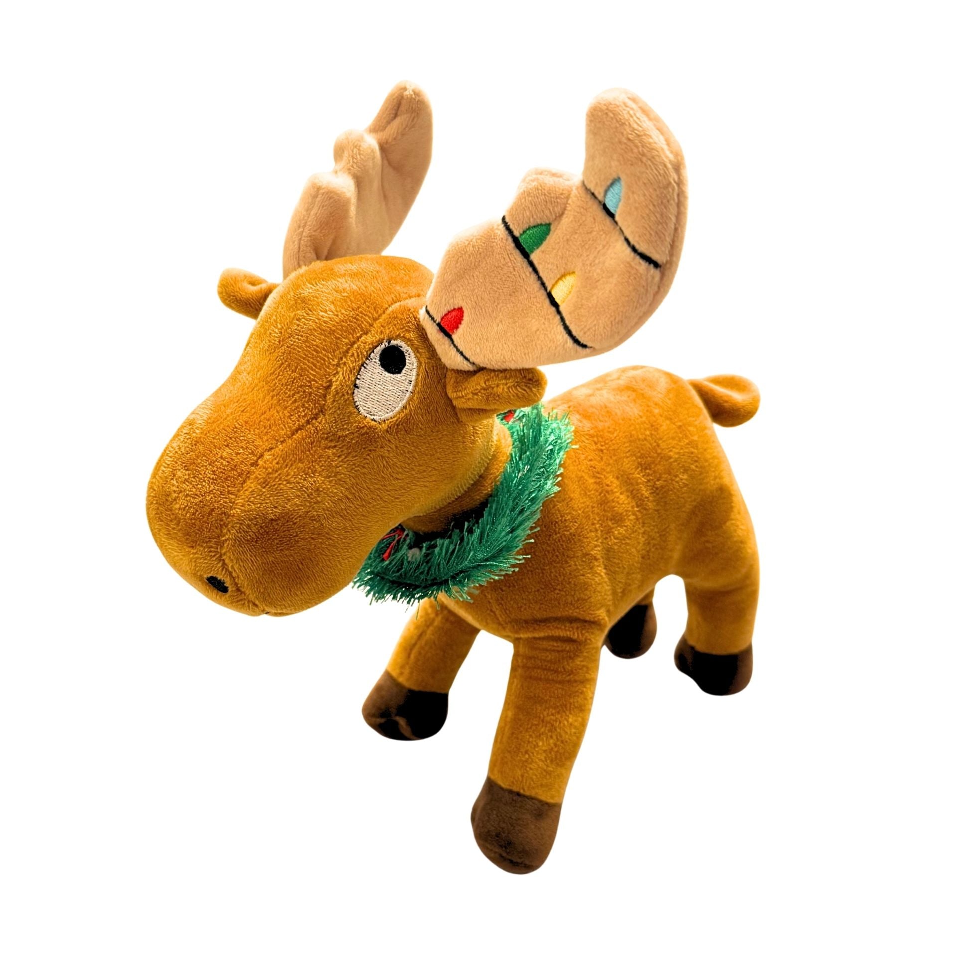 Plush moose toy with Christmas lights on antlers and green scarf on a white background