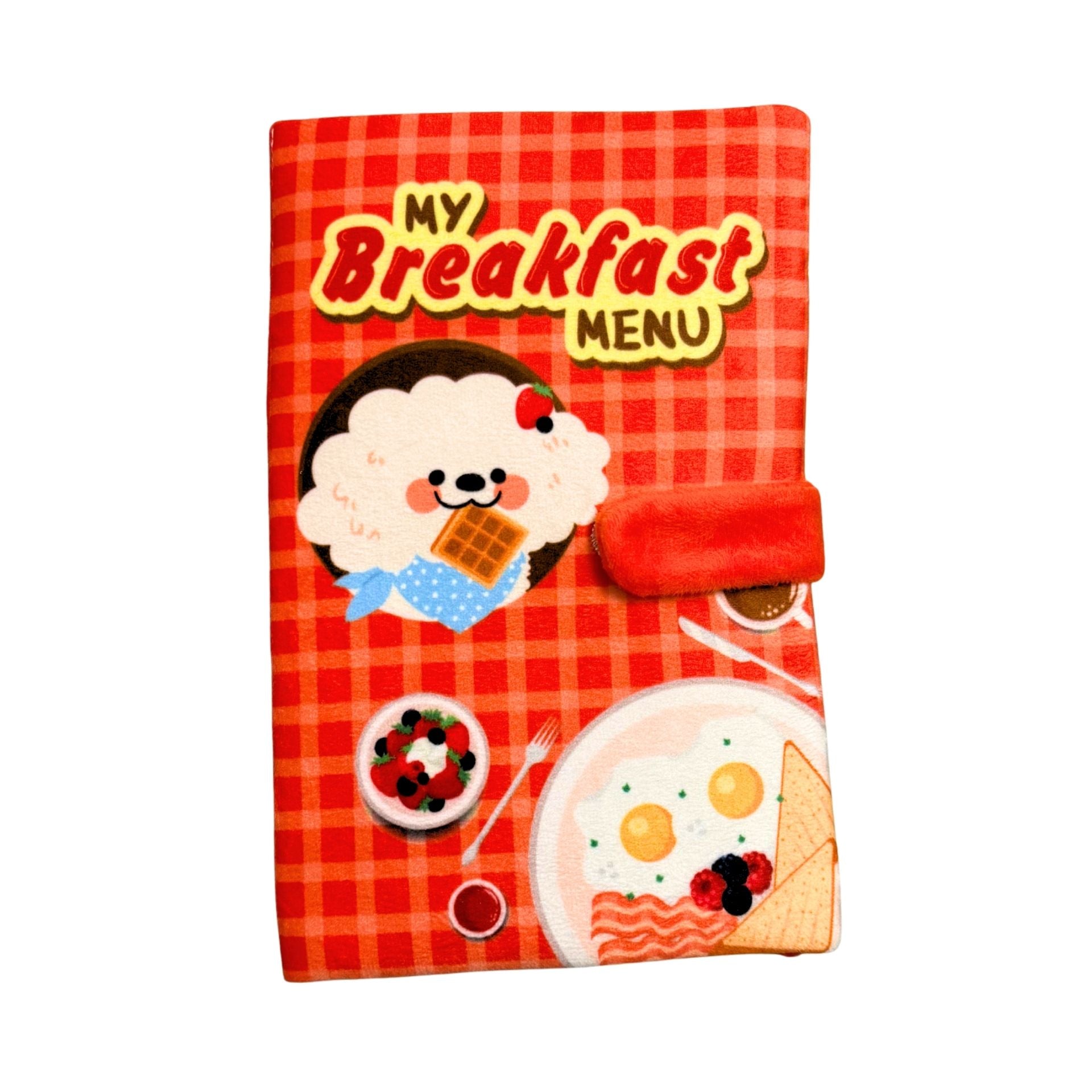 Red checkered notebook with cartoon character and 'My Breakfast Menu' text on a white background